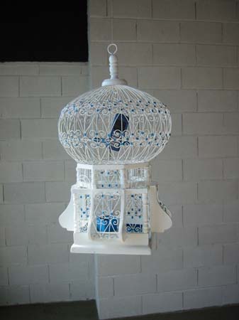 Bird cage with the mobile phone - 1